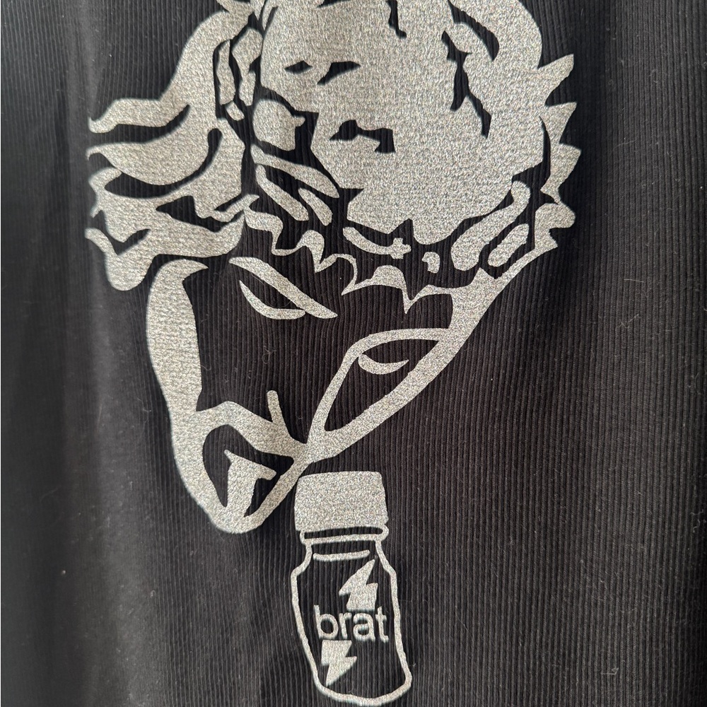 Black Graphic Tee with Silver Design
Charlie X Poppers Funny